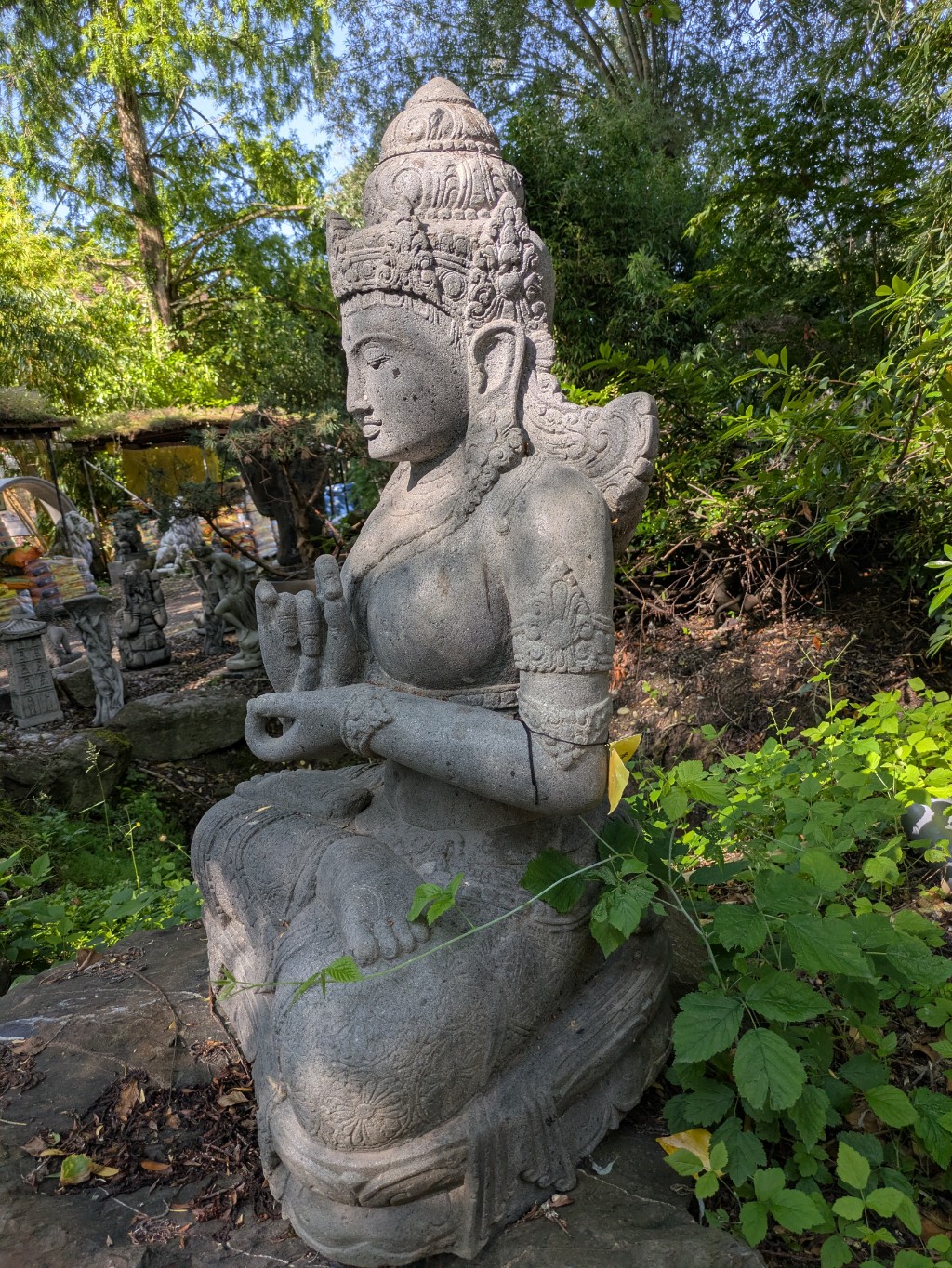 Dewi Sri sitzend Rad der Lehre -102cm Dewi Sri sitzend Rad der Lehre -102cm